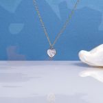 Collier coeur nacre sertie sur chaîne dorée