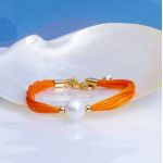 Bracelet une perle de culture blanche sur multi-cordon orange